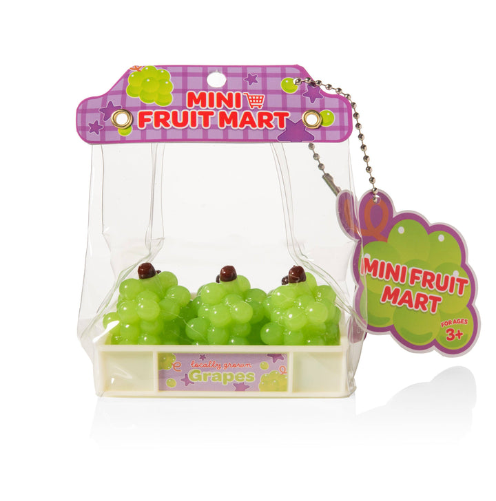 Miniature green grapes in a clear packaging with 'Mini Fruit Mart' branding on a white background.
