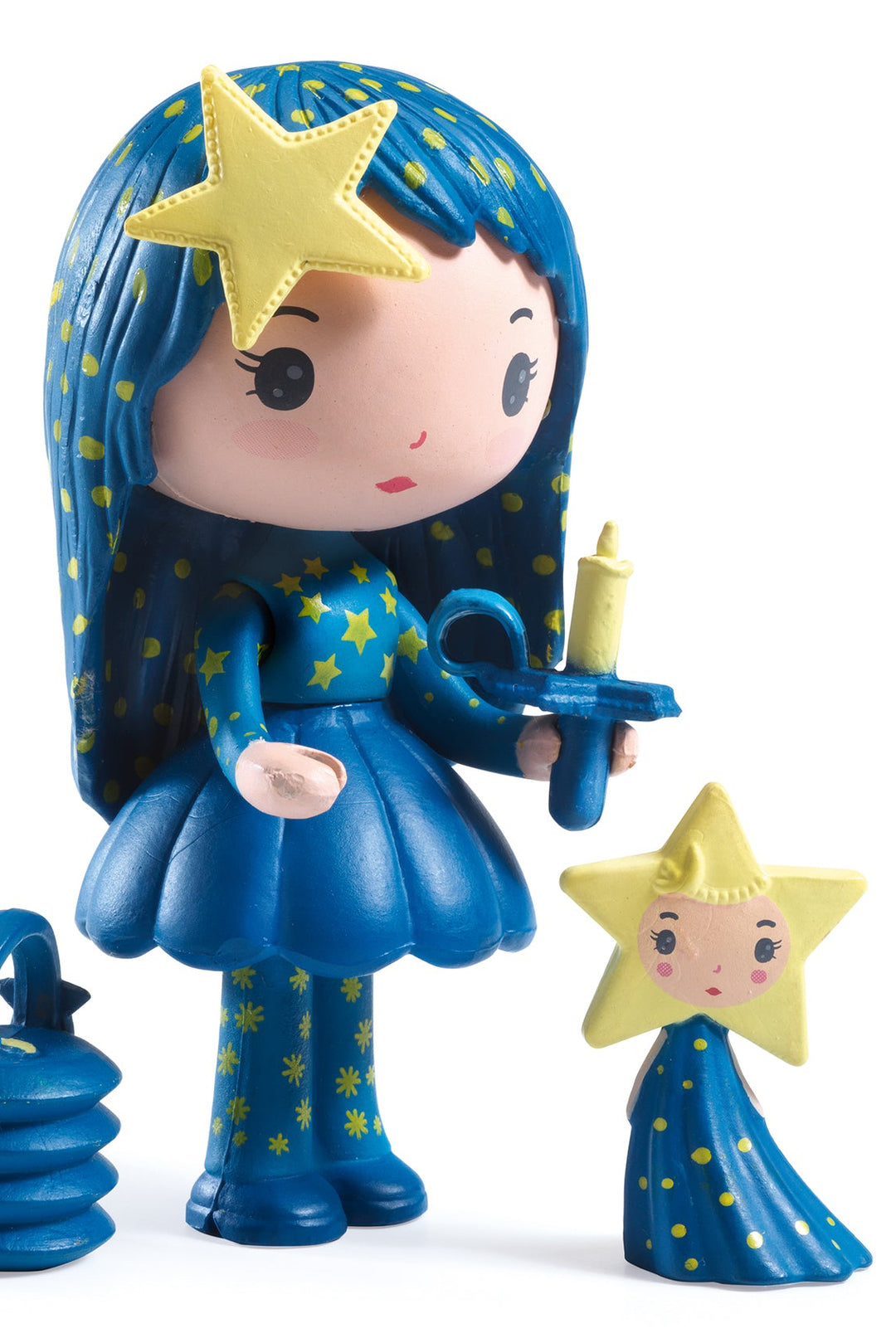 Toy figure with blue hair and dress, holding a star-shaped object on a white background