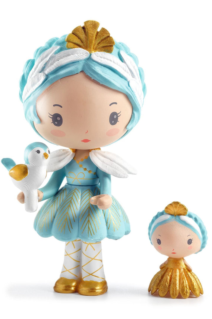 Two figurines in blue and gold attire with a white dove on a white background
