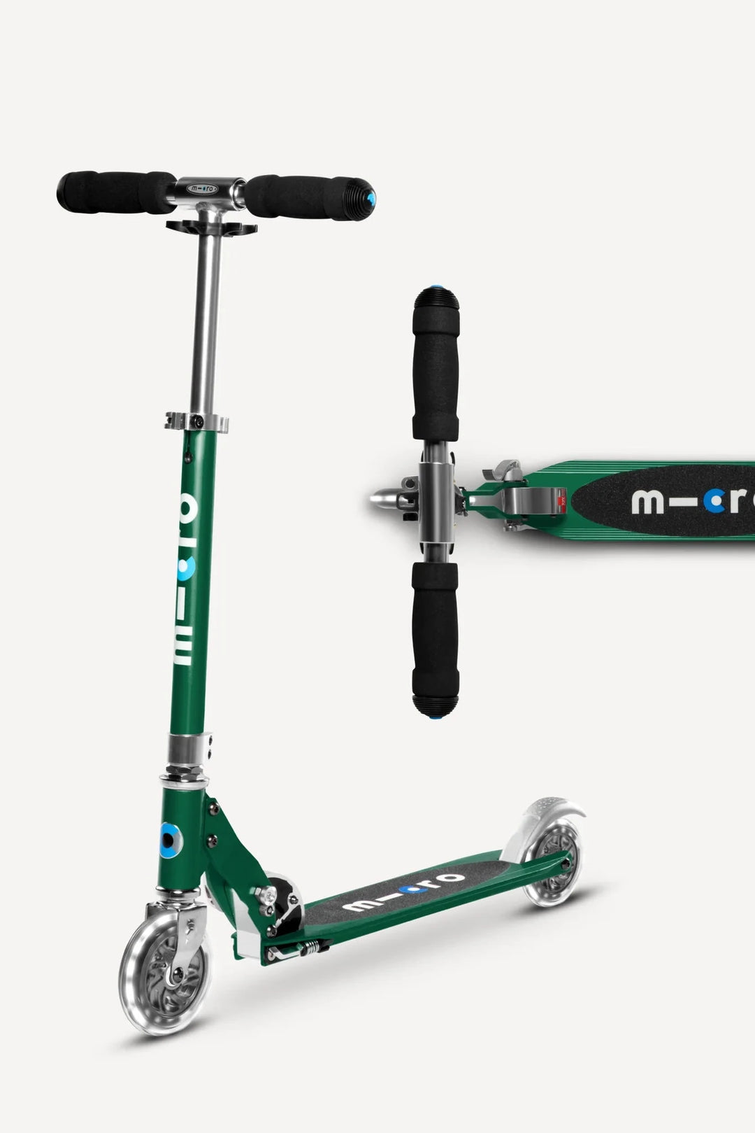 Green scooter with black handlebars on a white background