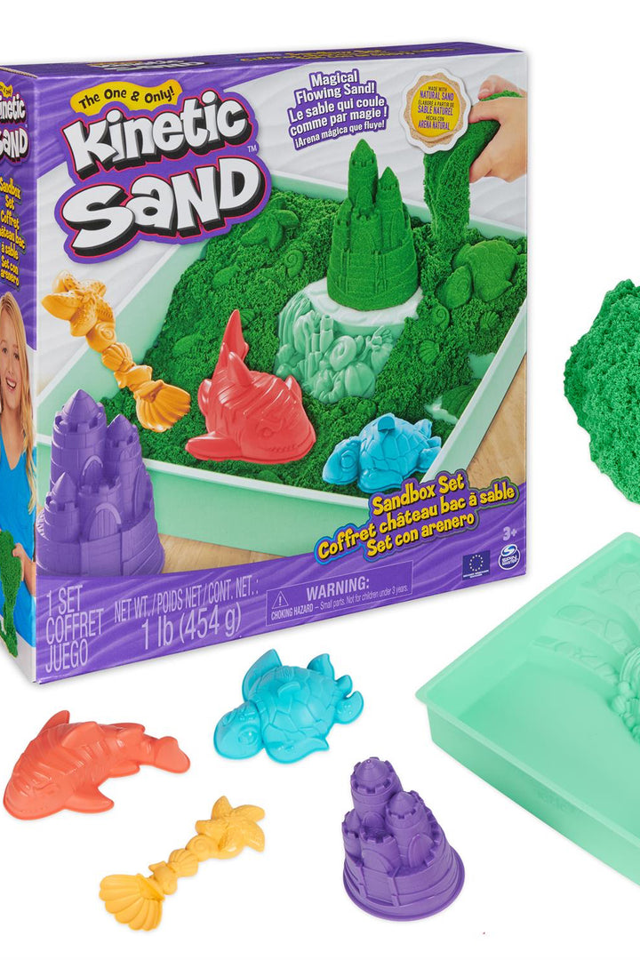 Photo of kinetic sand box with accessories. 