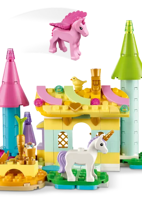 Children's toy set with colorful castle and unicorns on a white background