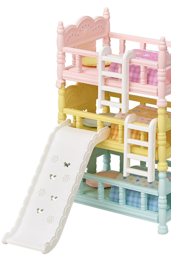 Multi Color three tiered bunk bed for triplets with pink, yellow and blue, and a slide to get down in the size of baby Calico Critters. 