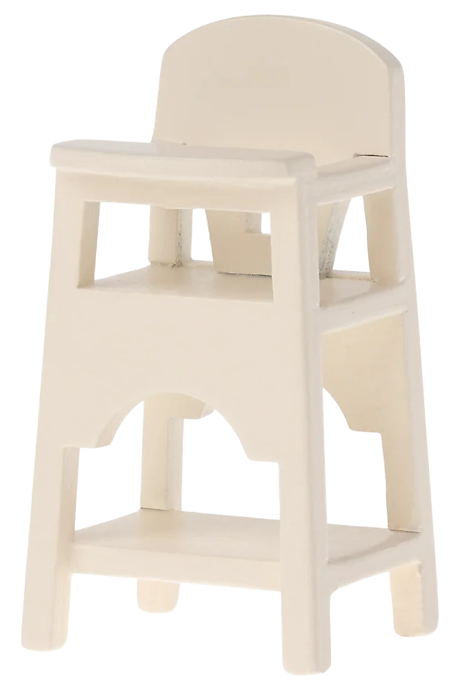 Beige high chair with a tray on a white background