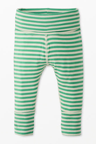 Green and white striped leggings on a white background