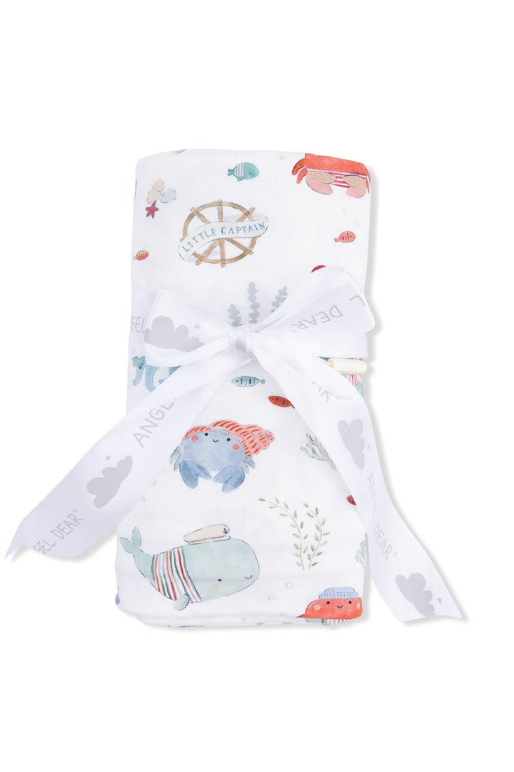 Baby swaddle with animal patterns on a white background