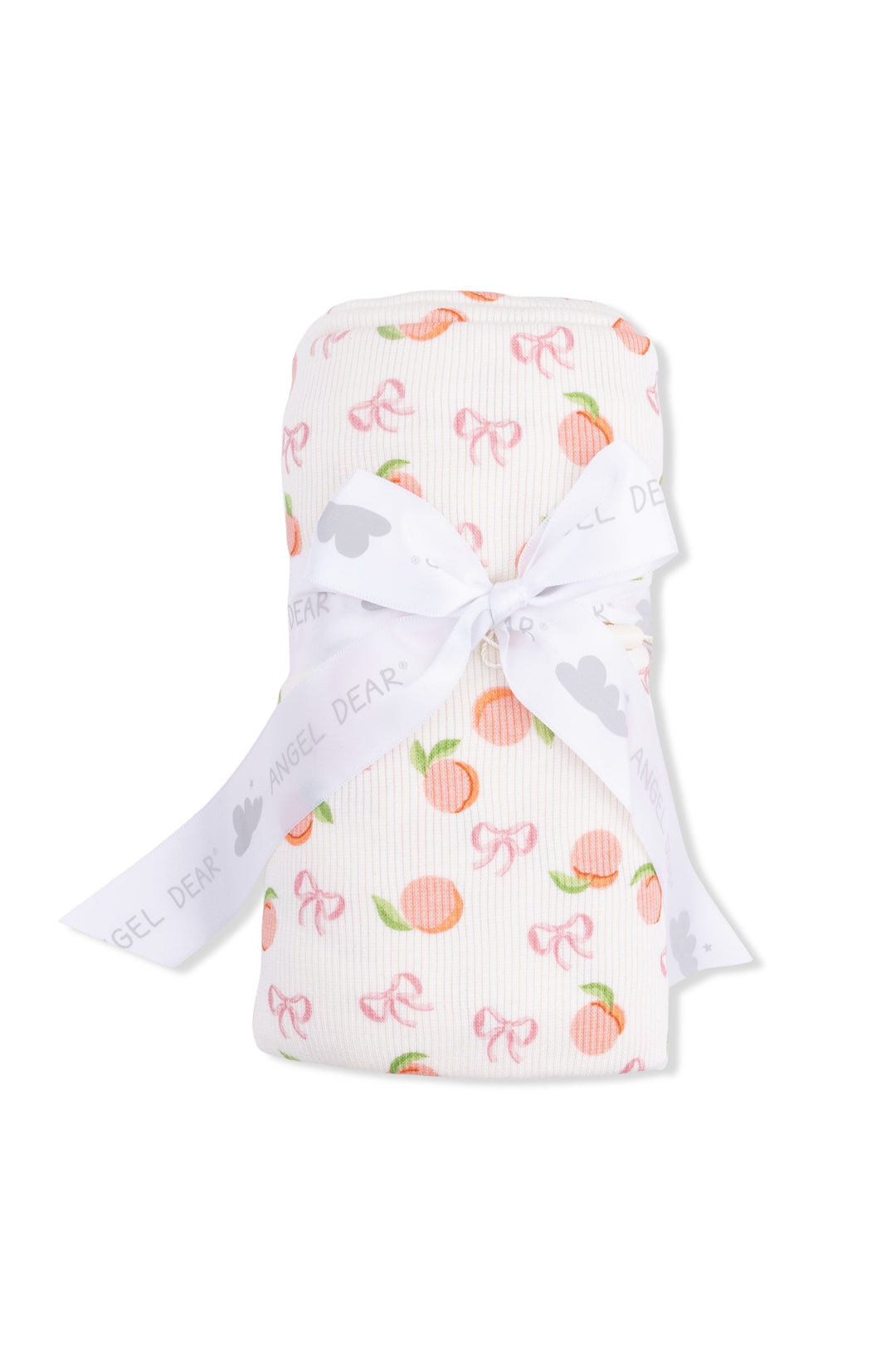 Baby blanket with peach and bow pattern on a white background