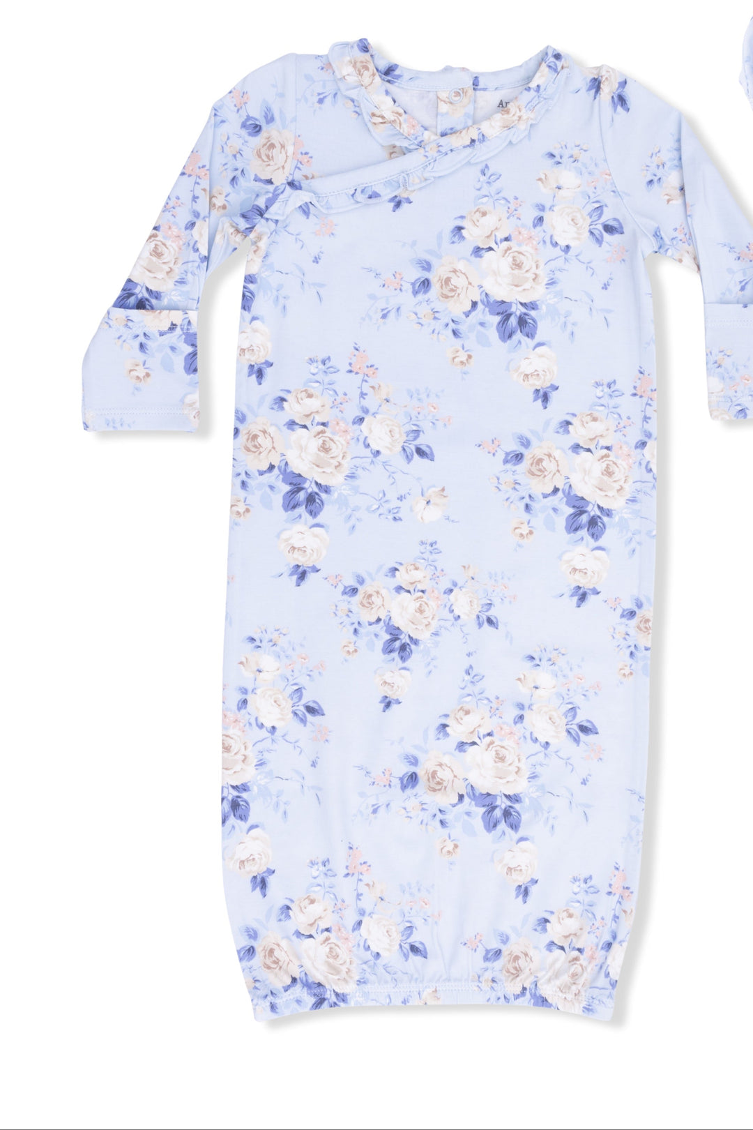 Baby gown with floral pattern and matching headband on a white background